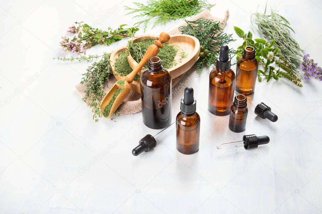 Bottles of essential oils. Herbal medicine. Aromatherapy.