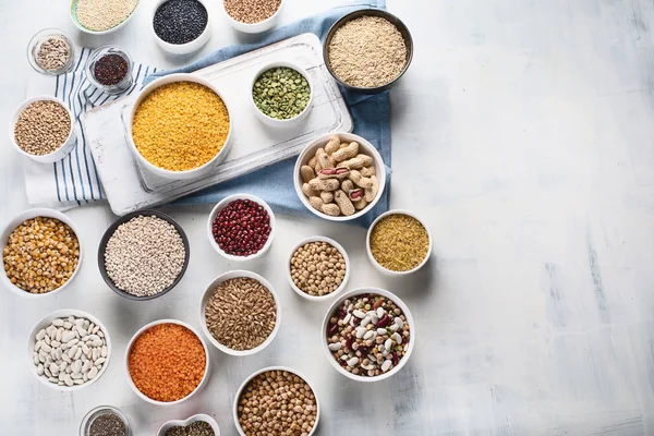 Various Grains Cereals Seeds Beans Bowls Table — Stock Photo, Image
