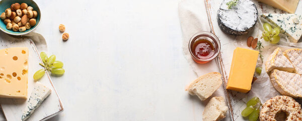 Different kinds of cheeses. Top view with copy space. Panorama