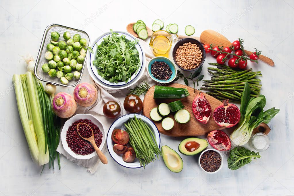 top view of Seasonal fresh vegan cooking ingredients on tabletop, healthy food concept