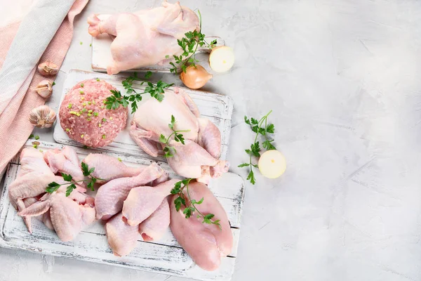 Different types of fresh chicken meat. Healthy diet eating. Top view with copy space