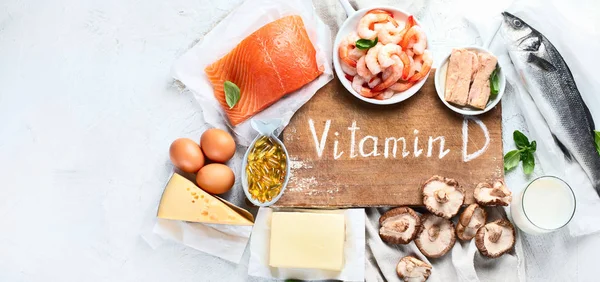 Gazdag élelmiszerek természetes D-vitamin panoráma, banner másolási spac — Stock Fotó