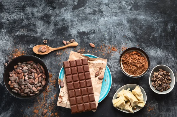 Cacao beans, powder, cacao butter  and chocolate bar