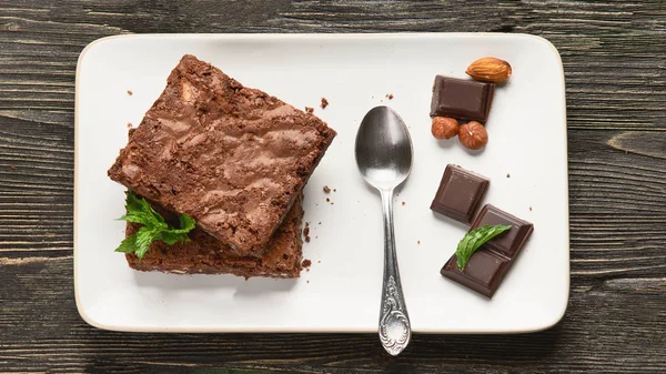 Chocolate brownie cake served on rectangle plate