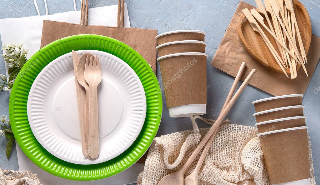 Natural eco-friendly utensils  on grey background. Sustainable lifestyle. Plastic free concept. Recycling and zero waste  concept