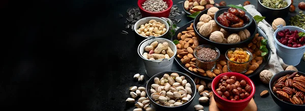 Different Types Nuts Seeds Dried Fruits Black Background Foods High — Stock Photo, Image