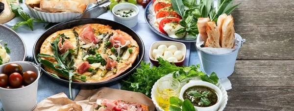 Appetizing Classic Italian Cuisine On Rustic Wooden Table Different Types Of Pizza Pasta Snacks And Capreze Healthy Homemade Food Parmesan Vegetarian Stock Photo 400128122