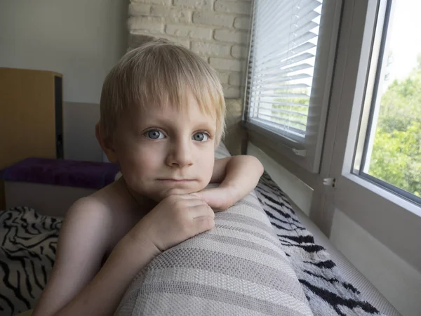 Little Caucasian Boy Sitting Sofa Windo — Stock Photo, Image