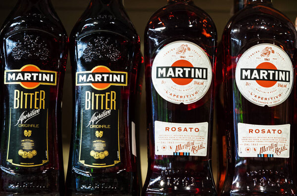 KIEV, UKRAINE - Sept 14, 2018: Martini bottles on store shelf. Gin is liquor which derives its predominant flavour from juniper berries.