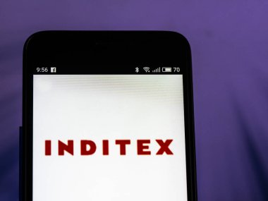 Kiev, Ukrayna - 27 ayarla, 2018: Inditex logo akıllı telefon görüntülenen gördüm. Industria de Diseño Textil, S.A. bir İspanyol çokuluslu giyim firması dünyanın en büyük moda grubu olarak üzerinde 7.200 mağazaları dünya çapında 93 pazarlarda faaliyet olduğunu.
