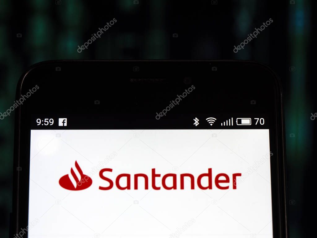 KIEV, UKRAINE - Set 27, 2018: Banco Santander logo seen displayed on smart phone. Santander Group  is a Spanish banking group.