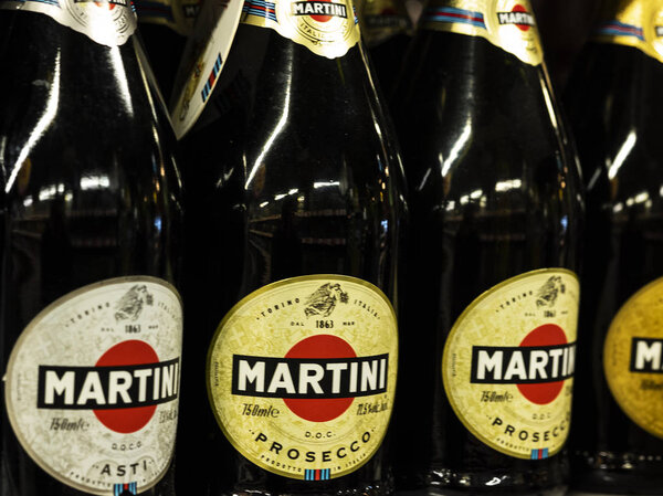 KIEV, UKRAINE Sept 28, 2018: Martini sparckling wines bottles on store shelf. Gin is liquor which derives its predominant flavour from juniper berries.