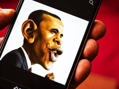 Kiev, Ukrayna - 7 Ekim 2018: Komik portre, Başkan Barack Obama bir akıllı telefon görüntülenen gördüm Facebook hesabı