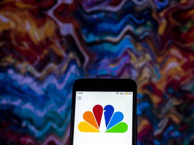 Kiev, Ukrayna - 10 Aralık 2018: Comcast telekomünikasyon şirket logosu akıllı telefon görüntülenen gördüm. 