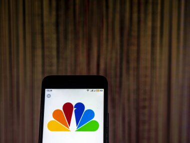 Kiev, Ukrayna - 10 Aralık 2018: Comcast telekomünikasyon şirket logosu akıllı telefon görüntülenen gördüm. 