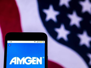 Kiev, Ukrayna - 16 Aralık 2018: Amgen biyoteknoloji şirket logosu akıllı telefon görüntülenen gördüm.
