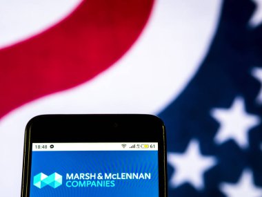Kiev, Ukrayna - 19 Aralık 2018: Marsh ve Mclennan şirketler sigorta şirket logosu akıllı telefon görüntülenen gördüm