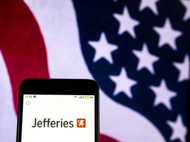 Kiev, Ukrayna - 20 Aralık 2018: Jefferies mali grup firma logosu akıllı telefon görüntülenen gördüm