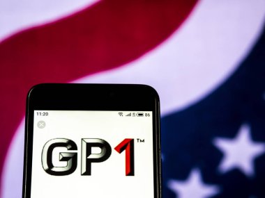 Grup 1 Otomotiv araba bayilik şirket logosu akıllı telefon görüntülenen gördüm