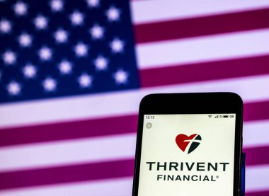 Kiev, Ukrayna - 28 Aralık 2018: Değil kâr Thrivent finansal kuruluş logosu akıllı telefon görüntülenen gördüm