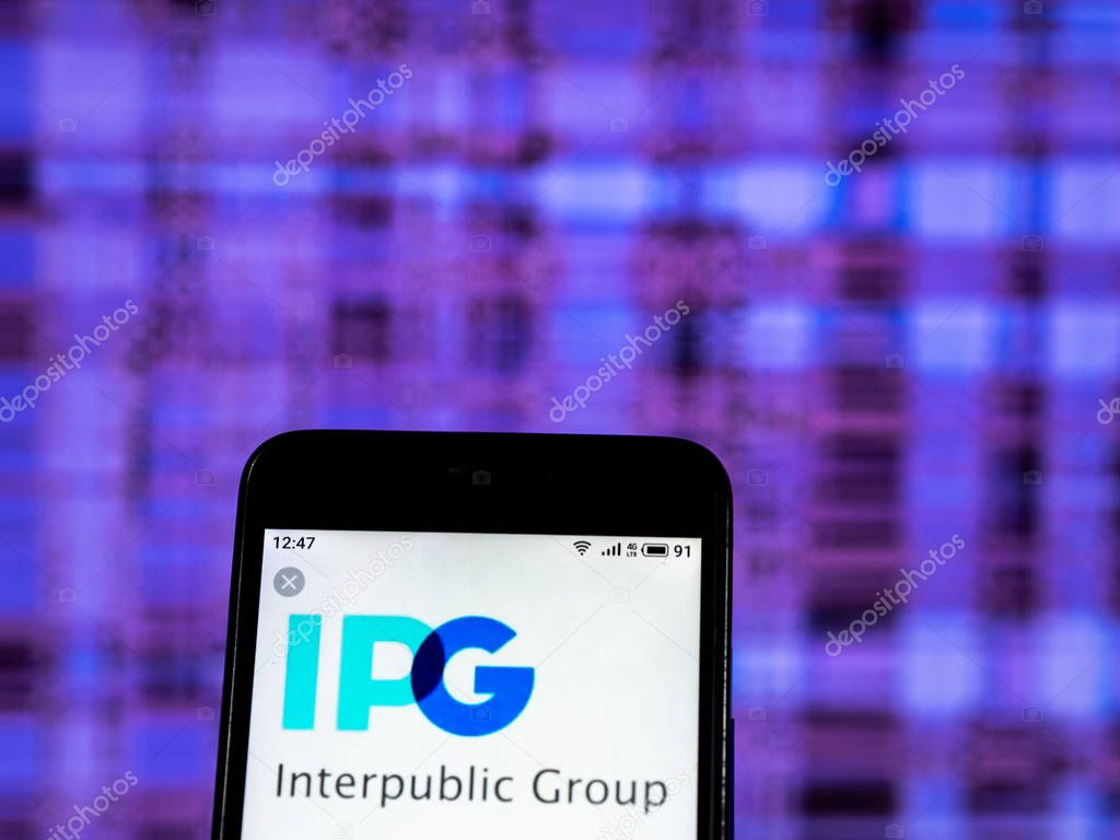 KIEV, UKRAINE - Dec 28,, 2018: Interpublic Group of Companies Advertising company logo seen displayed on smart phone