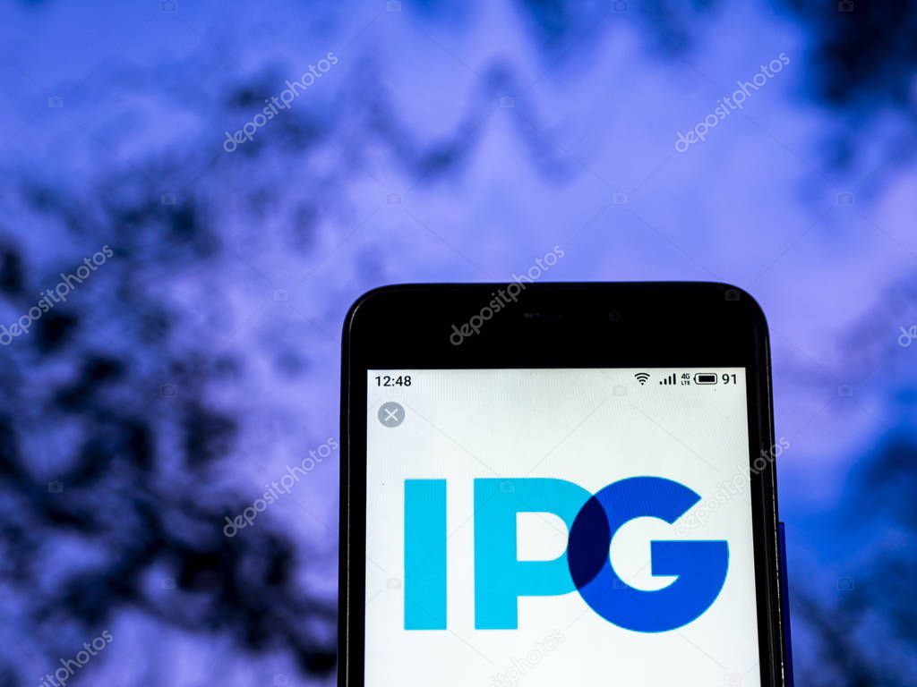 KIEV, UKRAINE - Dec 28,, 2018: Interpublic Group of Companies Advertising company logo seen displayed on smart phone