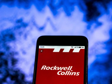 Kiev, Ukrayna - 30 Aralık 2018: Rockwell Collins uzay şirket logosu akıllı telefon görüntülenen gördüm