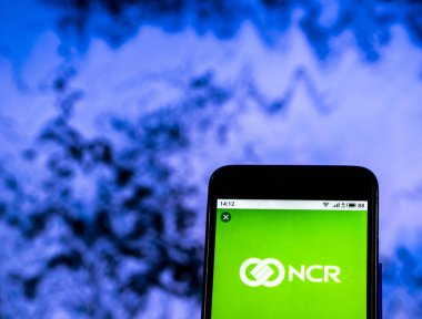 Kiev, Ukrayna - 30 Aralık 2018: Ncr Corporation Otomasyon şirket logosu akıllı telefon görüntülenen gördüm