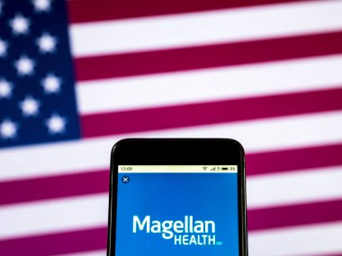 Kiev, Ukrayna - 3 Ocak 2019: Bakım şirket logosu Magellan sağlık yönetilen akıllı telefon görüntülenen gördüm