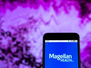 Kiev, Ukrayna - 3 Ocak 2019: Bakım şirket logosu Magellan sağlık yönetilen akıllı telefon görüntülenen gördüm