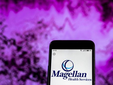 Kiev, Ukrayna - 3 Ocak 2019: Bakım şirket logosu Magellan sağlık yönetilen akıllı telefon görüntülenen gördüm