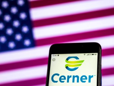 Kiev, Ukrayna - 7 Ocak 2019: Cerner şirket logosu akıllı telefon görüntülenen gördüm