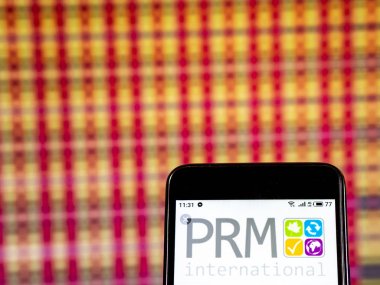 Kiev, Ukrayna - 7 Ocak 2019: Prm Internationa şirket logosu akıllı telefon görüntülenen gördüm