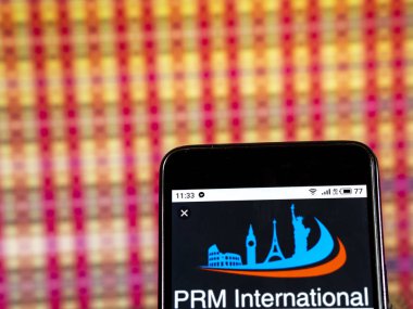 Kiev, Ukrayna - 7 Ocak 2019: Prm Internationa şirket logosu akıllı telefon görüntülenen gördüm