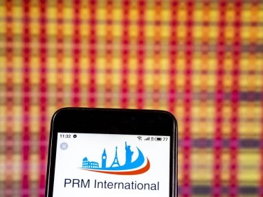 Kiev, Ukrayna - 7 Ocak 2019: Prm Internationa şirket logosu akıllı telefon görüntülenen gördüm