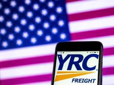 Kiev, Ukrayna - 7 Ocak 2019: Yrc dünya çapında Holding Şirket logosu akıllı telefon görüntülenen gördüm