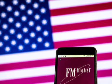 Kiev, Ukrayna - 7 Ocak 2019: Fm Global sigorta şirket logosu akıllı telefon görüntülenen gördüm
