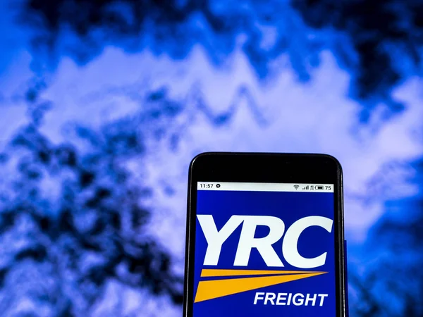 Kiev, Ukrayna - 7 Ocak 2019: Yrc dünya çapında Holding Şirket logosu akıllı telefon görüntülenen gördüm