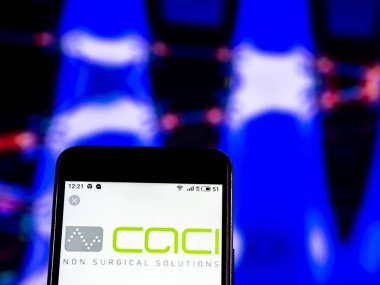 Kiev, Ukrayna - 9 Ocak 2019: Caci International Inc bilgi teknoloji şirket logosu akıllı telefon görüntülenen gördüm.