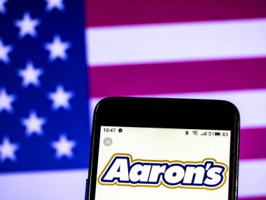 KIEV, UKRAINE - Jan 17, 2019: Aaron's, Inc. Furniture company logo seen displayed on smart phone