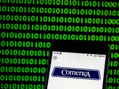 Kiev, Ukrayna - 18 Ocak 2019: Comerica mali hizmetler şirket logosu akıllı telefon görüntülenen gördüm