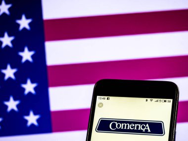 Kiev, Ukrayna - 18 Ocak 2019: Comerica mali hizmetler şirket logosu akıllı telefon görüntülenen gördüm