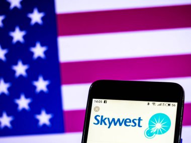 KIEV, UKRAINE - Jan 18, 2019: SkyWest Airlines Regional airline logo seen displayed on smart phone
