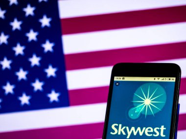 KIEV, UKRAINE - Jan 18, 2019: SkyWest Airlines Regional airline logo seen displayed on smart phone
