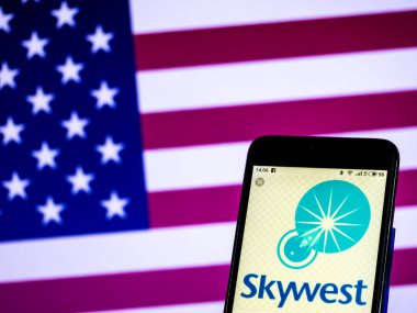 KIEV, UKRAINE - Jan 18, 2019: SkyWest Airlines Regional airline logo seen displayed on smart phone