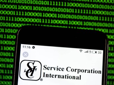 Kiev, Ukrayna - Jan 19, 2019: Service Corporation International cenaze ev şirket logosu akıllı telefon görüntülenen gördüm