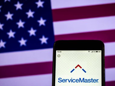 Kiev, Ukrayna - Jan 20, 2019: Hizmet küresel Holdings, Inc, görülen logosu görüntülenen akıllı telefon