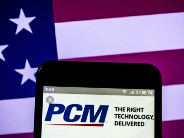 Kiev, Ukrayna - 16 Şubat 2019: Pcm, Inc görülen doğrudan pazarlama şirket logosu görüntülenen akıllı telefon