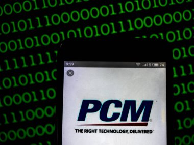 Kiev, Ukrayna - 16 Şubat 2019: Pcm, Inc görülen doğrudan pazarlama şirket logosu görüntülenen akıllı telefon