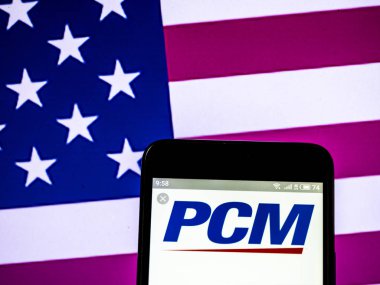 Kiev, Ukrayna - 16 Şubat 2019: Pcm, Inc görülen doğrudan pazarlama şirket logosu görüntülenen akıllı telefon